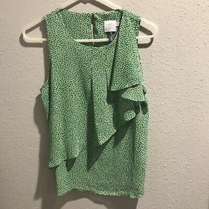 Green hd in Paris top with keyhole button close at base of neck